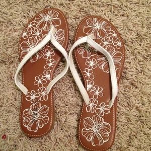 Brown flip flops