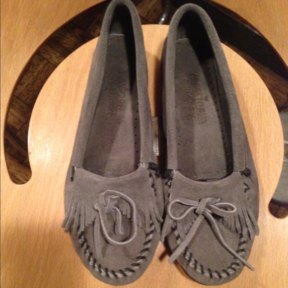 Gently used Gray Minnetonka moccasins.