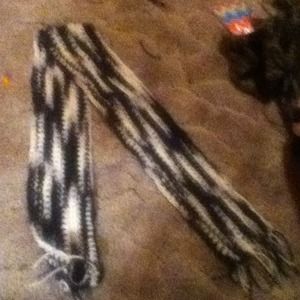 Black and white crochet scarf.