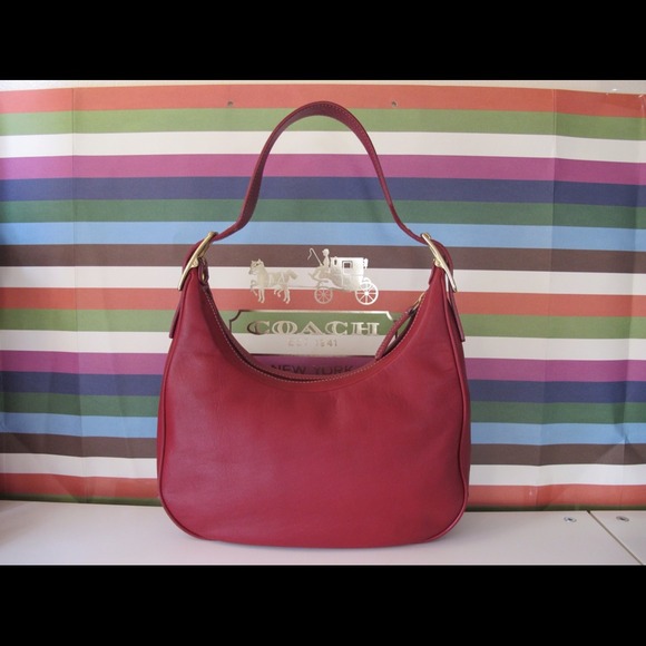 Authentic pre-owned Coach Handbag.