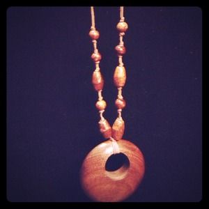Fabulous wooden necklace easy and fun to wear.