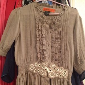 Brown short sleeve blouse.