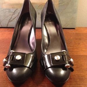 Super cute Nine West Black Leather wedge heels.
