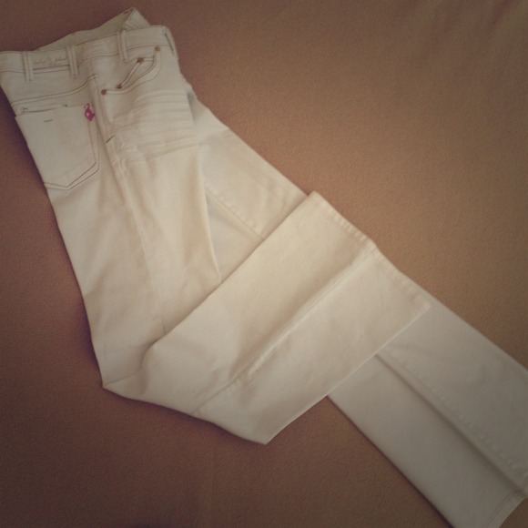 White Baby Phat Jeans with Pink And Green Trim.