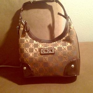 Brown purse with tags attached