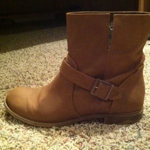 Brown boots with buckle and floral inside pattern