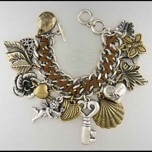 Charm bracelet with suede ribbon