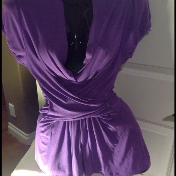 REDUCED ECI wrap around top.