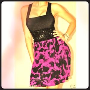 Bebe purple and black rhinestone stress