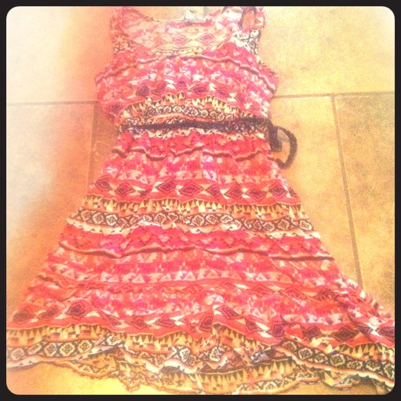 Wild print dress with small brown leather belt