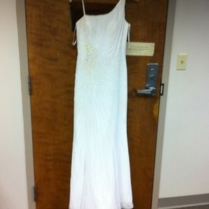 Beautiful white formal dress with a train