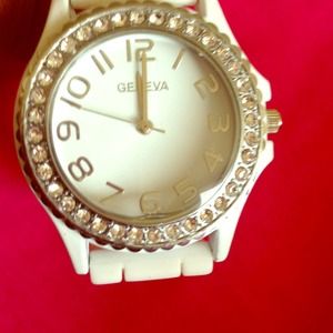 A white blinged out Geneva watch
