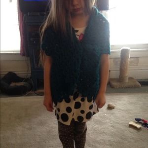 Child size shrug. Should fit child 5-7 years old.