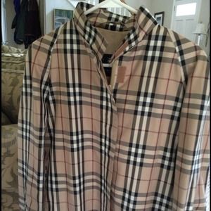 RESERVED Burberry of London cropped rain jacket.