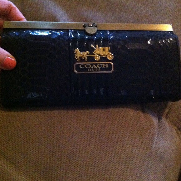 Black and gold faux coach wallet