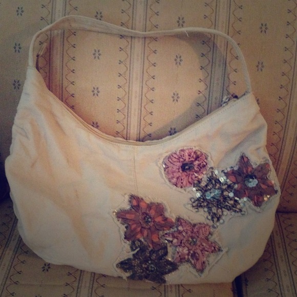Beige colored hand made bag