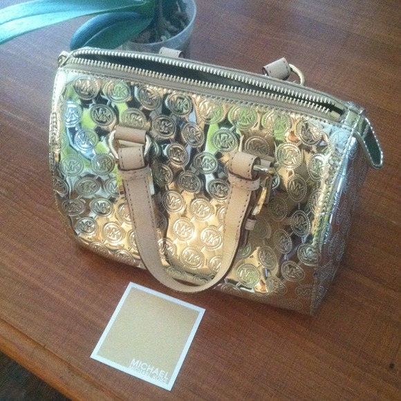 Med gold Michael Kors Grayson monogram, never used
