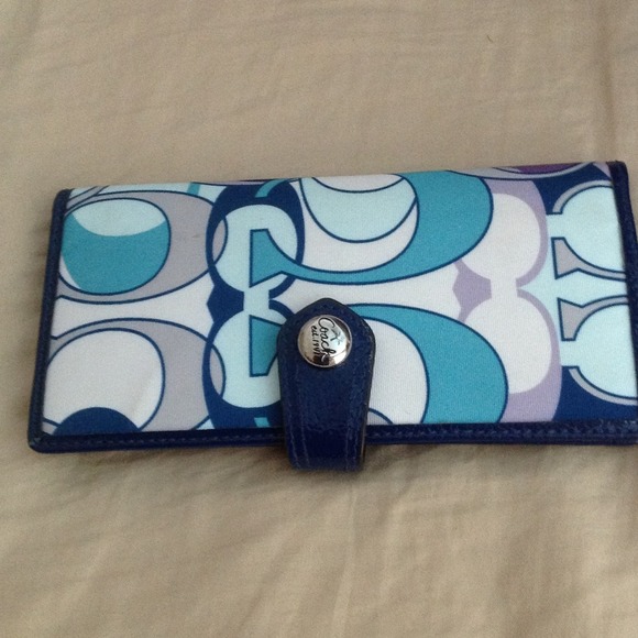 Authentic COACH check book wallet.