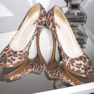 Cheetah print heels with wooden heel