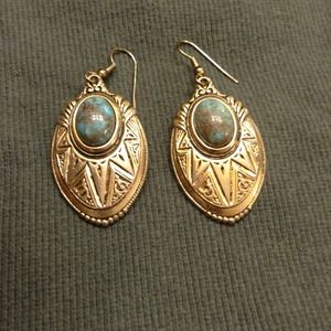 Sterling Silver earrings with turquoise stones.