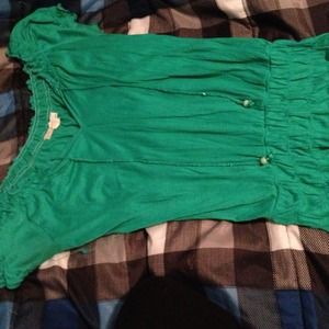 Sold in bundle. Green ruffled top