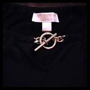 Michael Kors black blouse with gold chain neckline