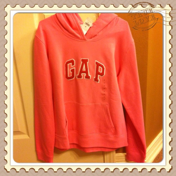 Brand new pink sweatshirt. Never been worn.