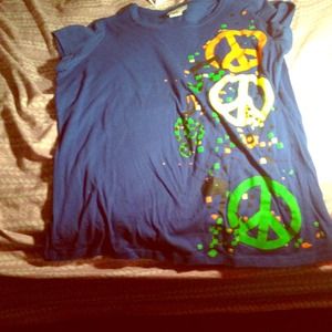 Royal blue shirt with peace signs