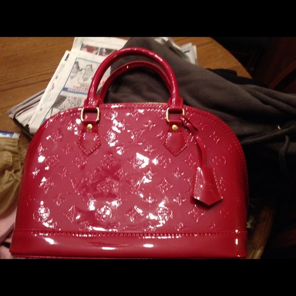 Red patent leather satchel