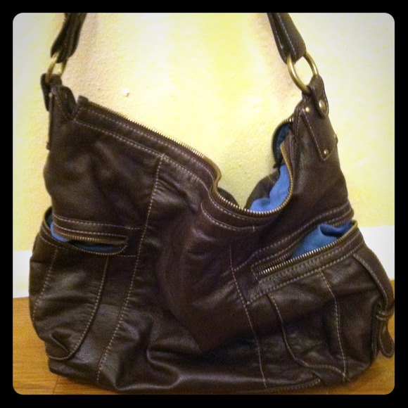 Blue lining on brown leather bag