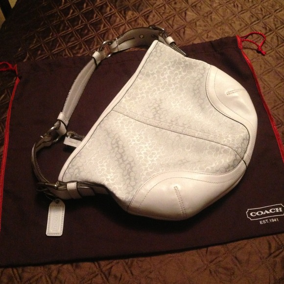 Mid sized authentic coach purse