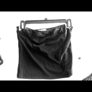 Cache little black top and long skirt.