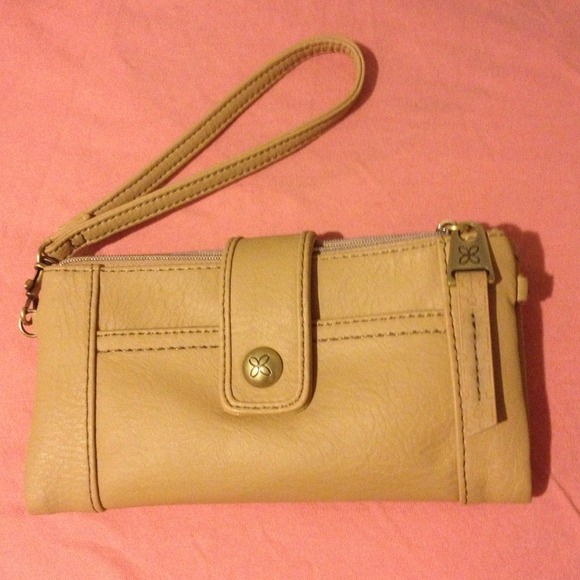 Reserved !Reduced nwot Tan relic wallet