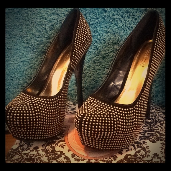 Gold and black heels