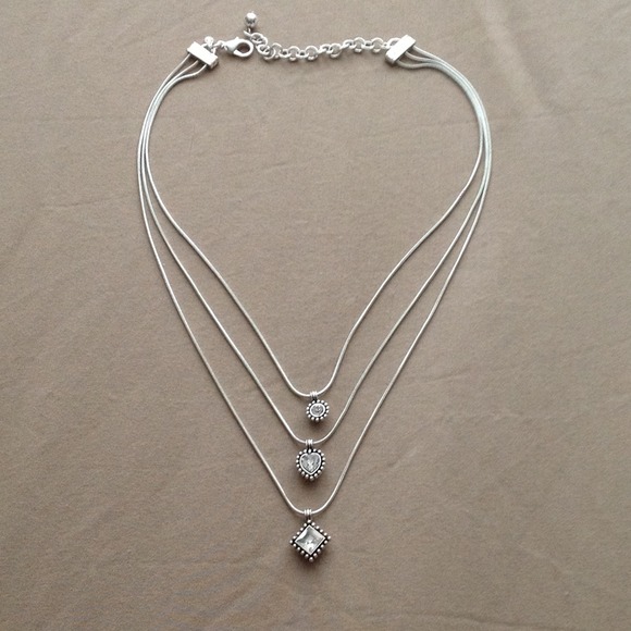 Silver three strand necklace.