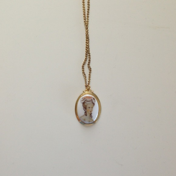 Antiquated Necklace with Face Detail