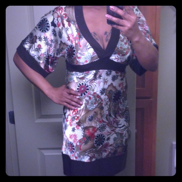 Very pretty silky dress. Never worn!