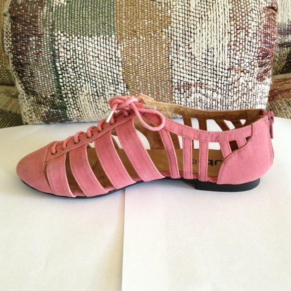 Pink suede, cut out Oxford flats with laces.