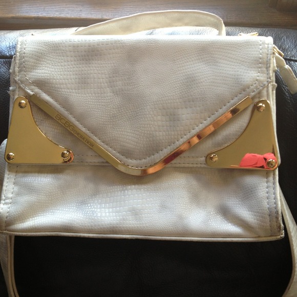 BCBG Generation white and gold purse hold