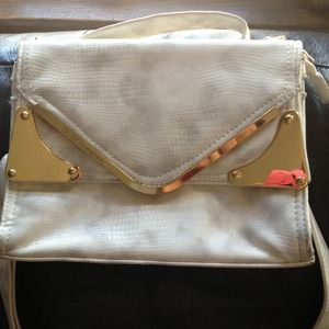 BCBG Generation white and gold purse hold