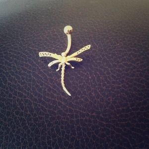 Gold dragonfly belly button ring.
