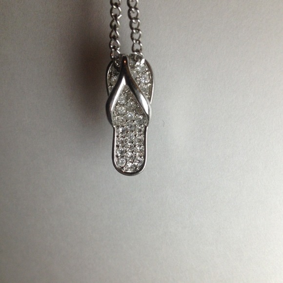 Super cute silver rhinestoned flip flop necklace!