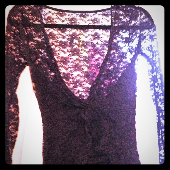 Size small, black cling top with lace overlay.