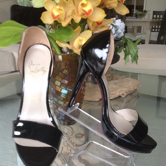 Black patent platform sandals, red sole