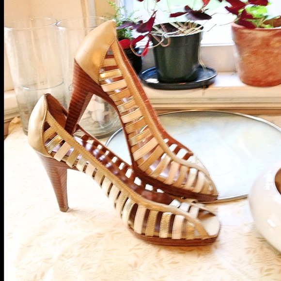 Size 7 gold and silver, strappy high heels.