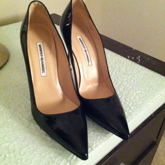Manolo Blahnik shows size 38.5. Never worn.