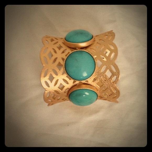 Gold cuff with turquoise stones