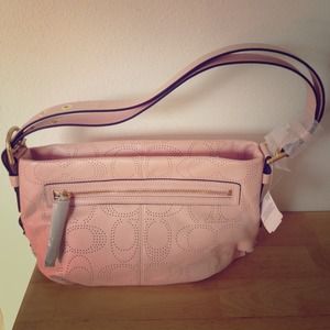 Coach perforated leather handbag