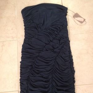 Brand new, Short length teal dress with rushing.