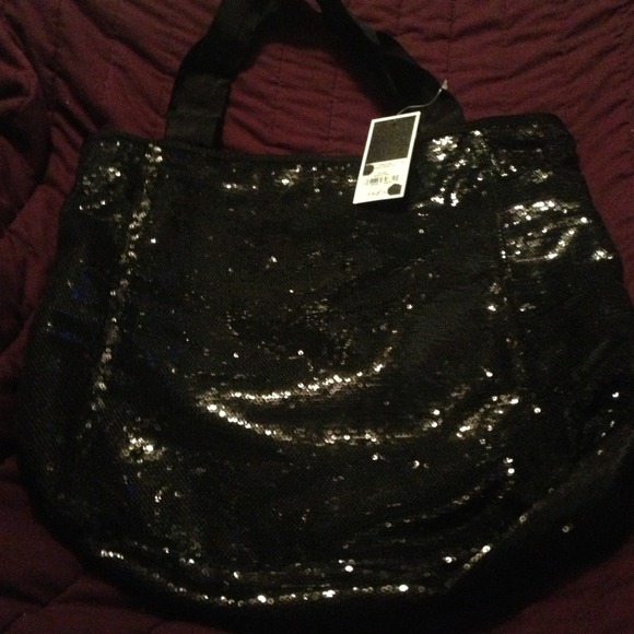 Black sequence juicy couture purse.
